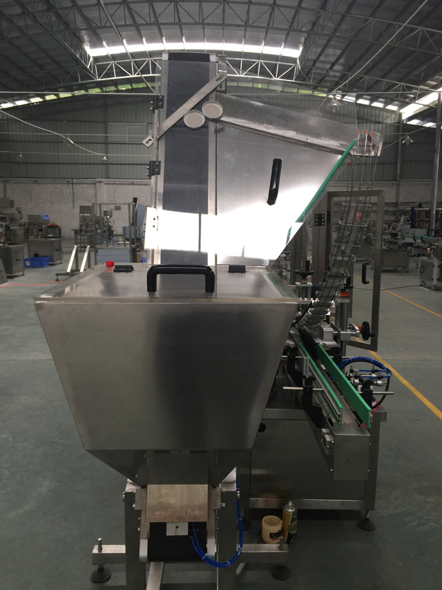 automatyczny system podawania czapek.jpg