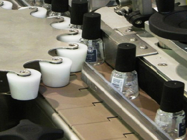 butelki z obrotowym kołem gwiazdowym do etykietowania.jpg