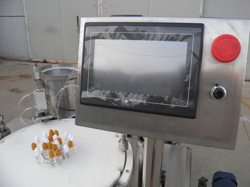 filling plugging capping labeling production line E-liquid PLC napełniacz butelek zakręcanie etykietowanie.jpg