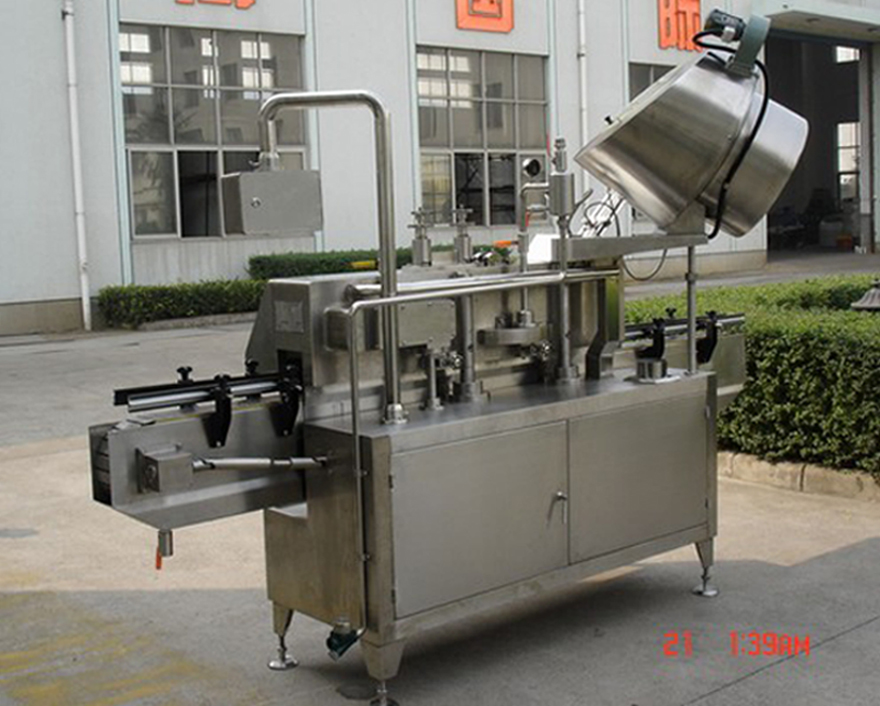 PLC-controlled system glass Jar twist off Steam Capper equipment vacuum capping machine for Glass Jars tylne zdjęcie zakrętki próżniowej typu twist-off.jpg