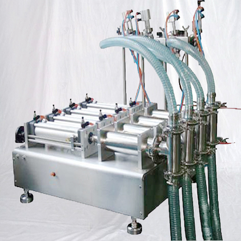 cztery głowice maszyny napełniające.jpg