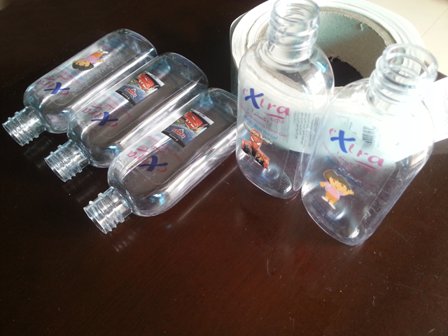 transparent labels labelled samples bottles plane surface Mrwan przykładowe etykiety transparentne i butelki (3).jpg